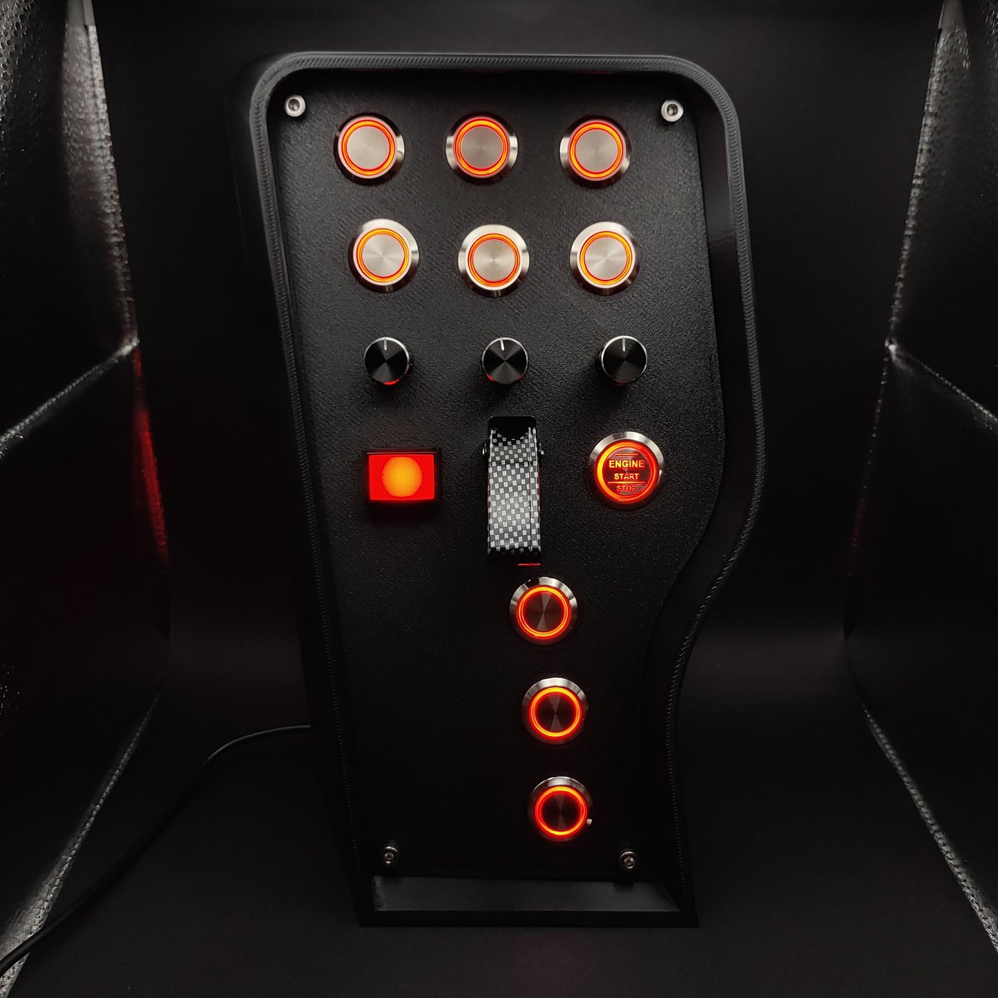 Front view of the Classic - Red Edition button box with a matte textured panel, featuring 10 vibrant red LED buttons and a carbon fibre toggle switch cover.