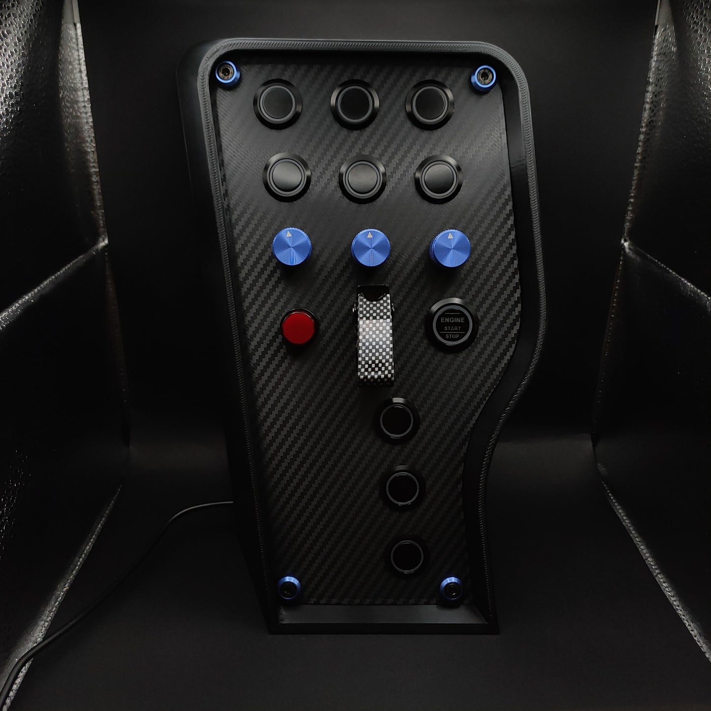 Sport+ Blue Edition sim racing button box with blue aluminium encoders and carbon fibre toggle switch.