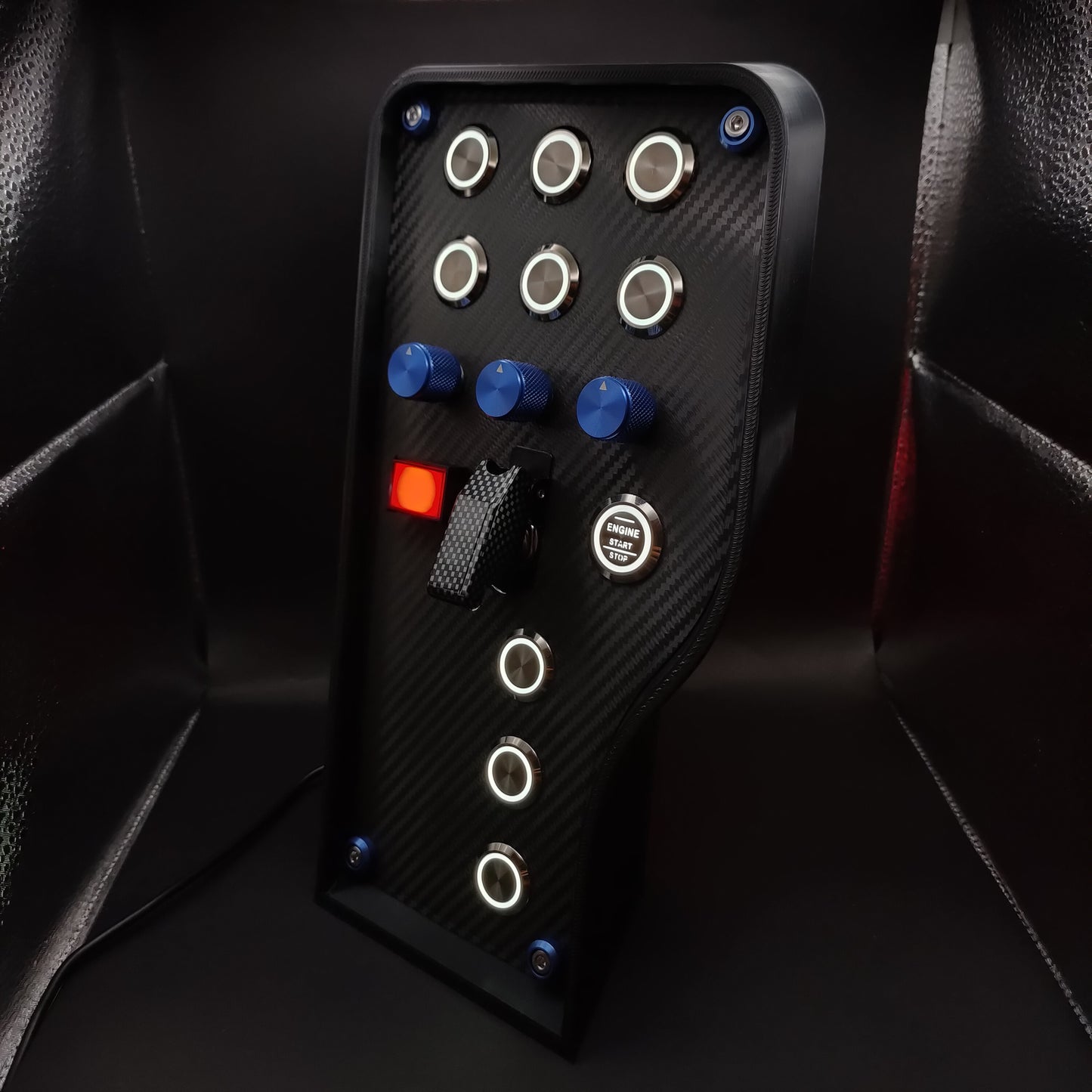 Left perspective of GT Blue button box showing blue anodised aluminium rotary encoders and white LEDs.