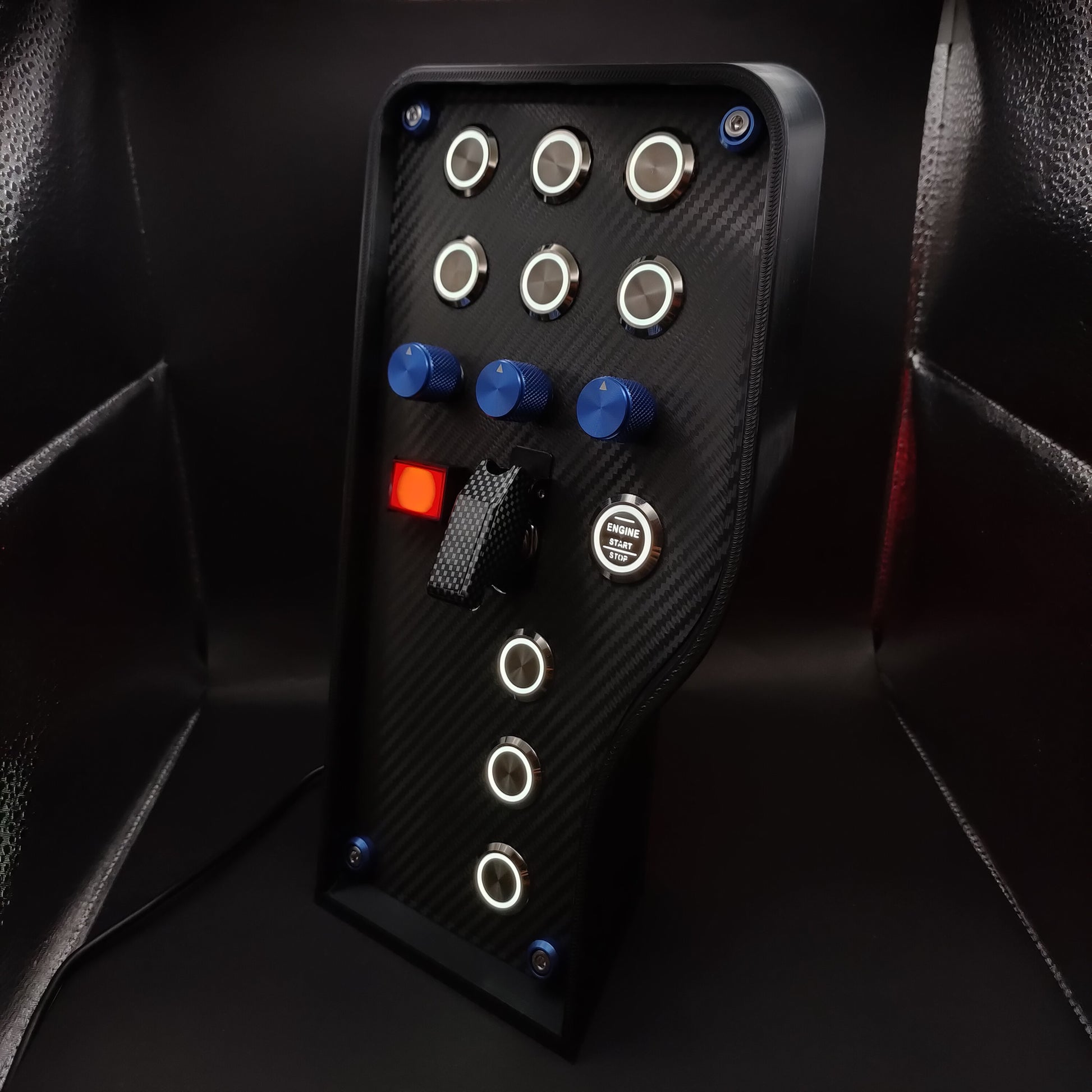 Left perspective of GT Blue button box showing blue anodised aluminium rotary encoders and white LEDs.
