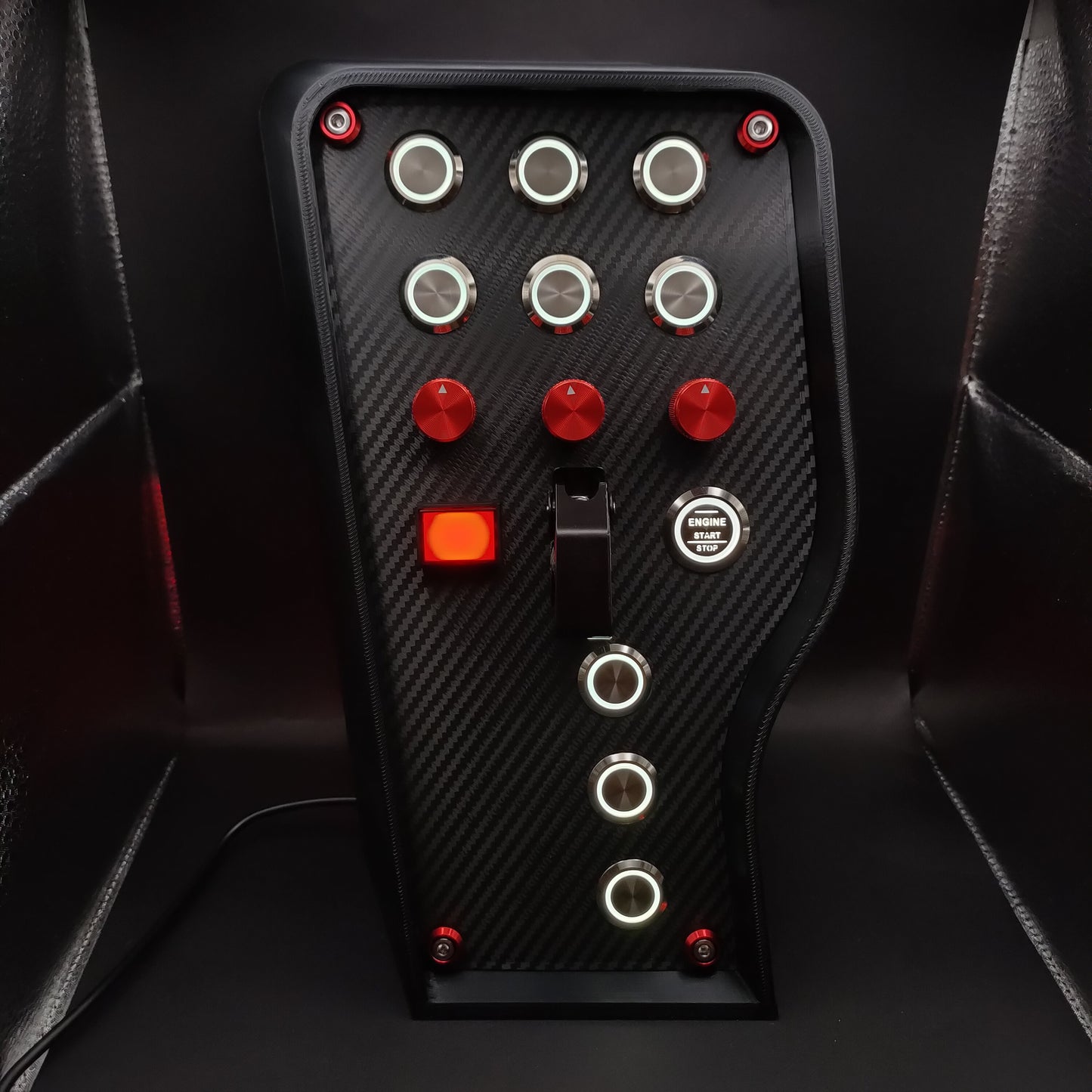 GT Red Edition sim button box with carbon fibre panel, white LEDs, and black ignition toggle cover.