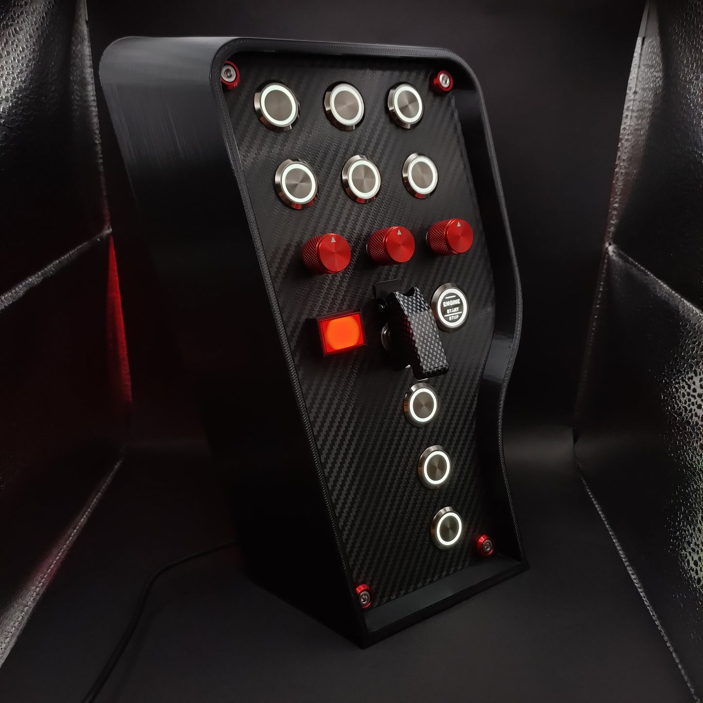 Right angle view of GT Red Edition box highlighting polished chrome hardware and white illumination.