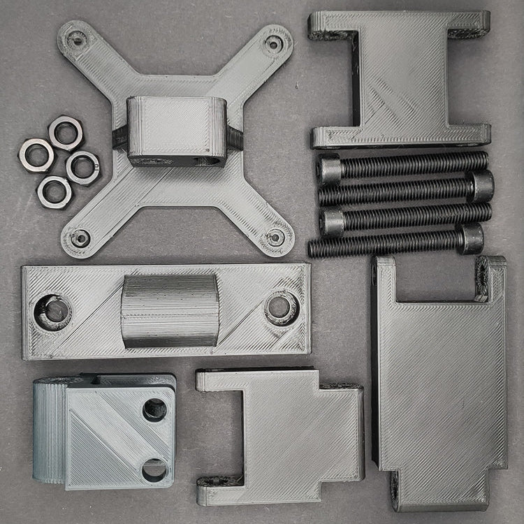 Complete kit from above: arm segments, button box mounting plate, M8 bolts, and T-nuts for full adjustment.