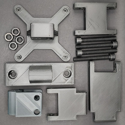 Complete kit from above: arm segments, button box mounting plate, M8 bolts, and T-nuts for full adjustment.