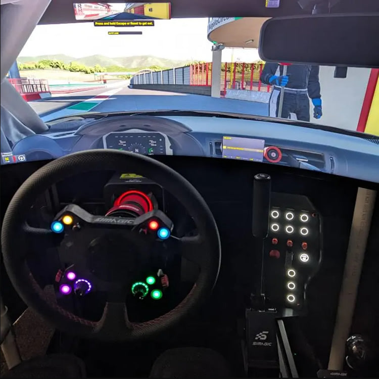 Simulator steering wheel and custom OSG button box.