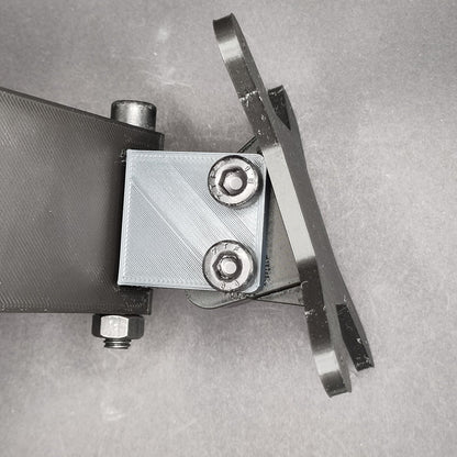 Button box mounting plate swivelled 45 degrees to the left, showing flexible angle adjustment for an ergonomic and accessible racing setup.