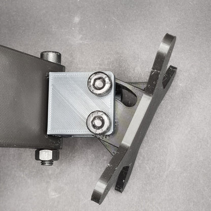 Close-up of the button box mounting plate, angled 45 degrees to the right, highlighting its full swivel range for personalised button box positioning.