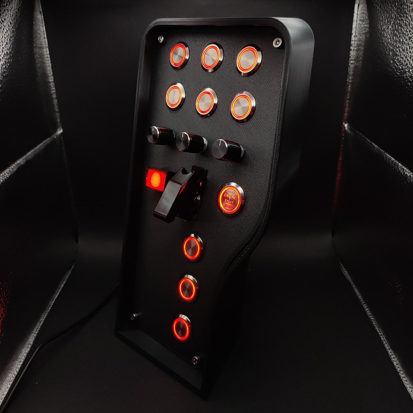 Left-side profile highlighting the isometric curved edge and chrome button array with red LEDs.