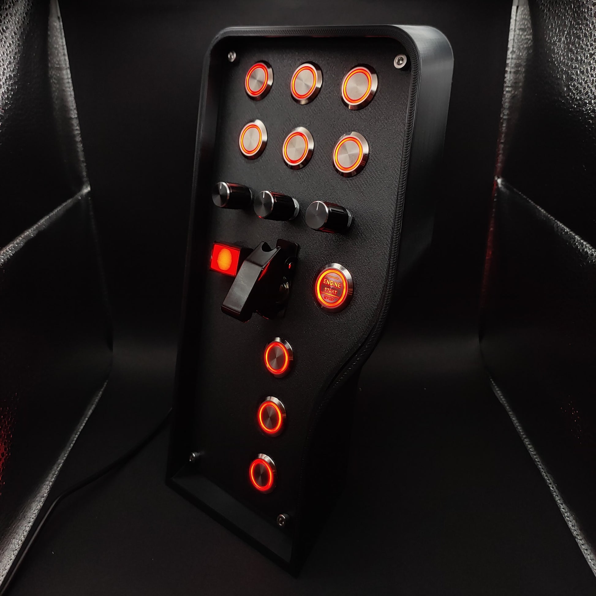 Left-side profile highlighting the isometric curved edge and chrome button array with red LEDs.