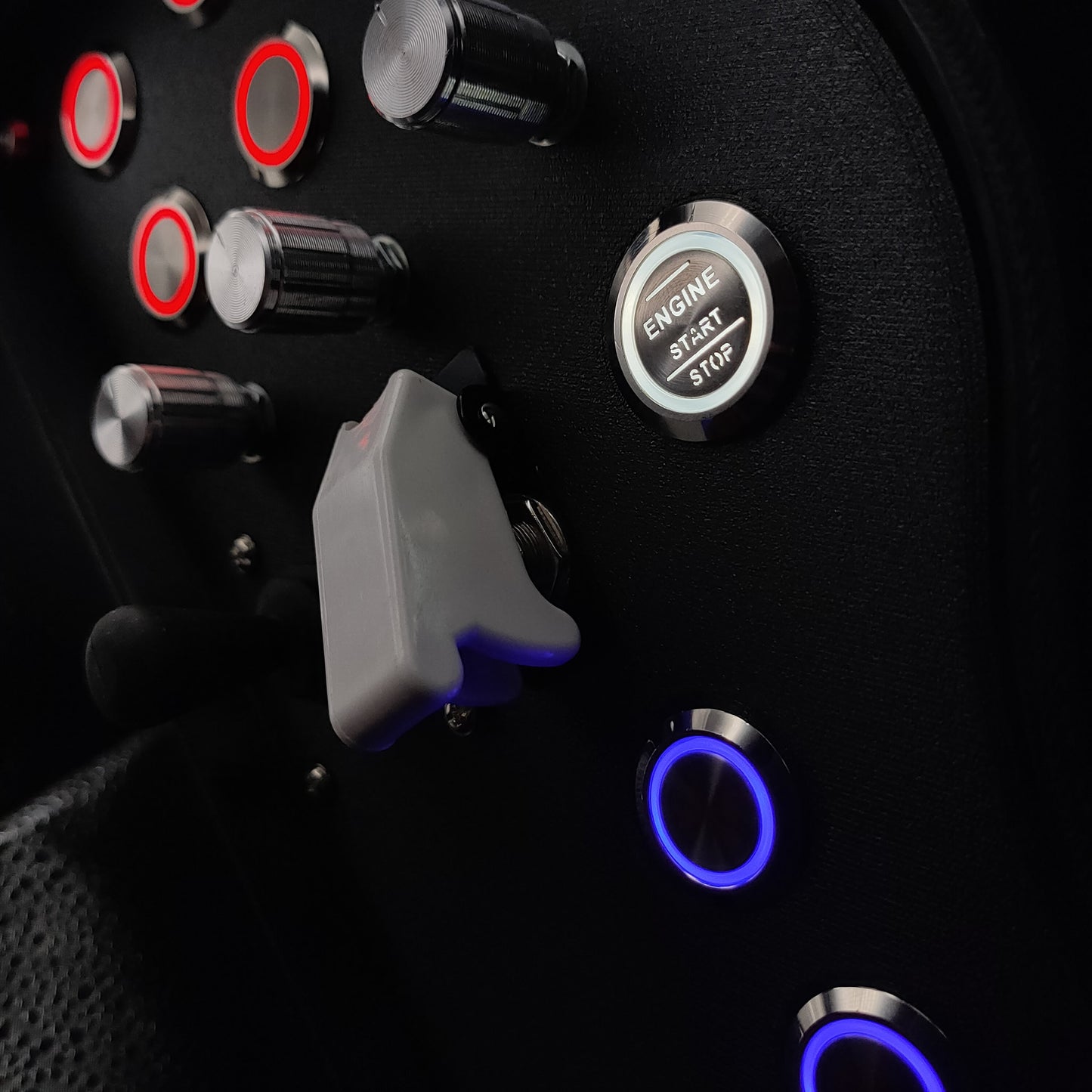 Close-up of the tactile 4-way navigation joystick and chrome LED buttons on the Daytona Edition.