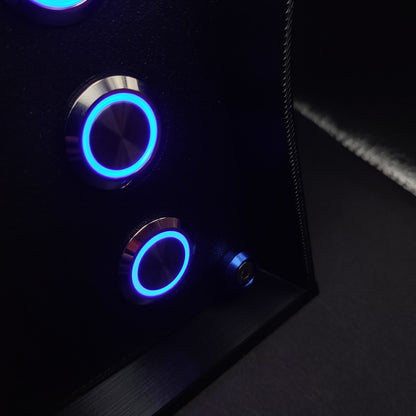 Detail shot of the chrome buttons with blue LEDs and the matching blue anodised aluminium hardware.