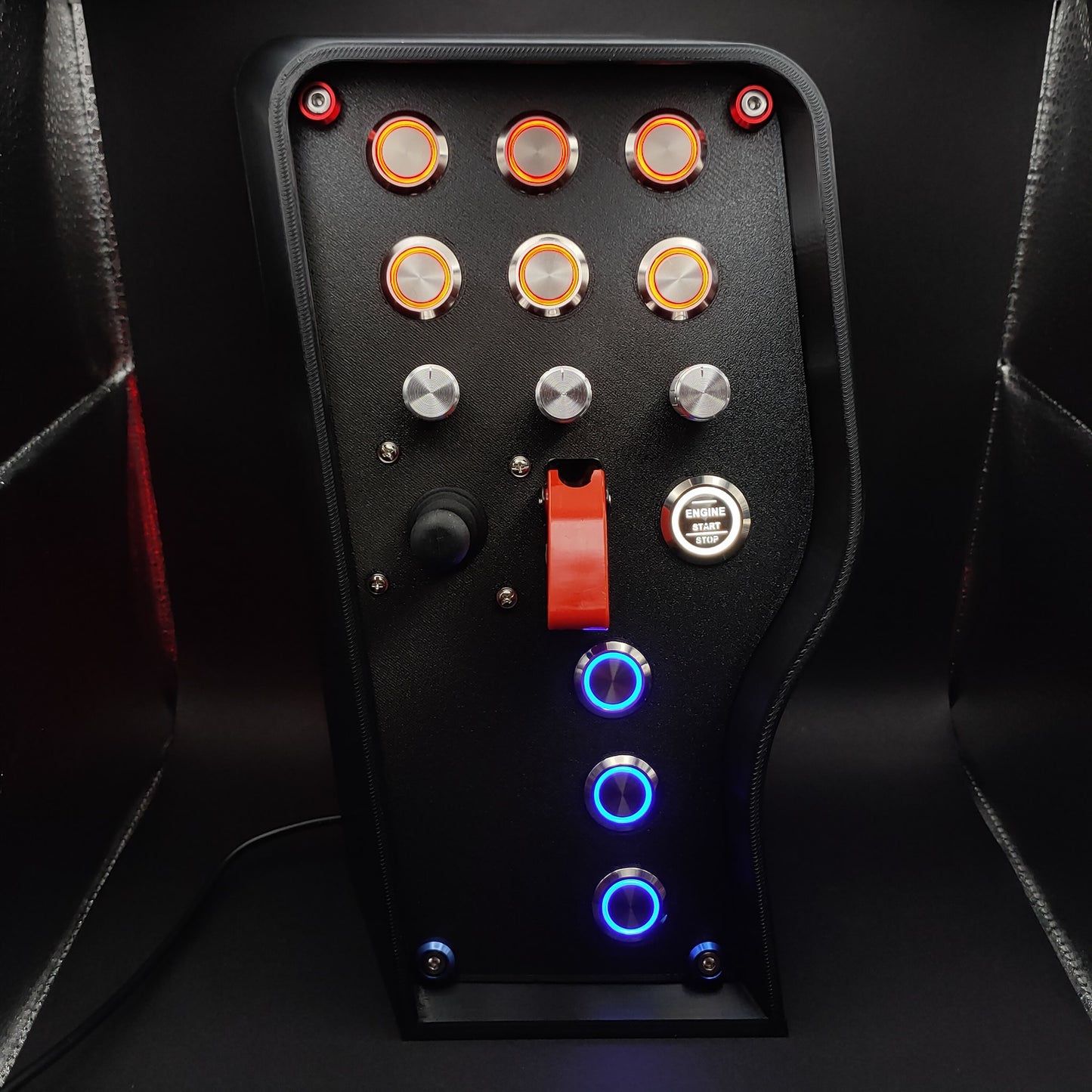OSG Daytona Edition sim racing box featuring patriotic LEDs with a matching red toggle cover.