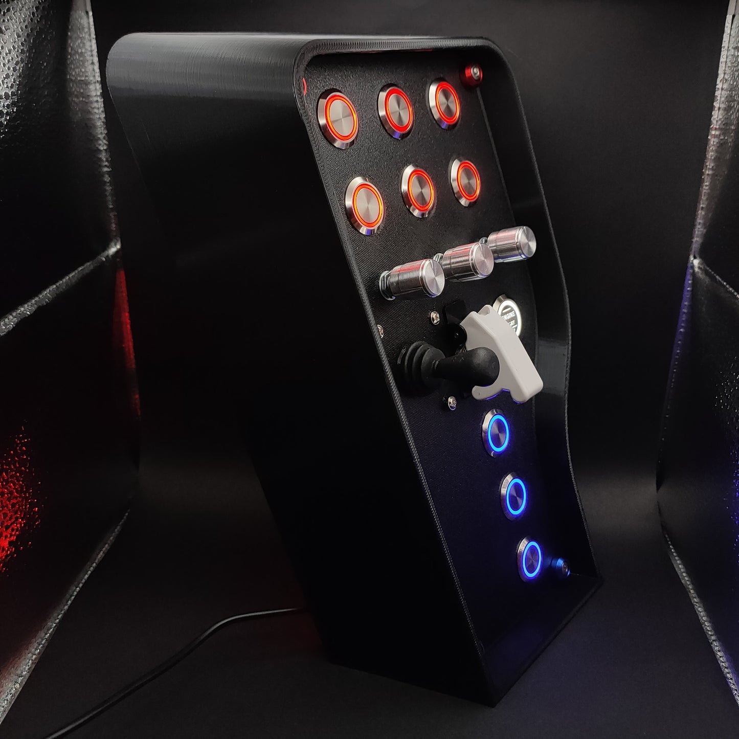 Right angle view of the Daytona Edition showing the 4-way menu joystick and red/blue trim.