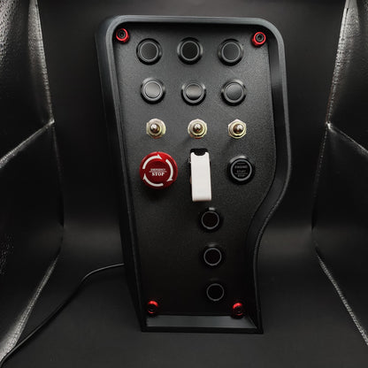 Nürburgring Edition sim box showing the red anodised E-Stop with matching hardware trim and matte black finish (LEDs off).