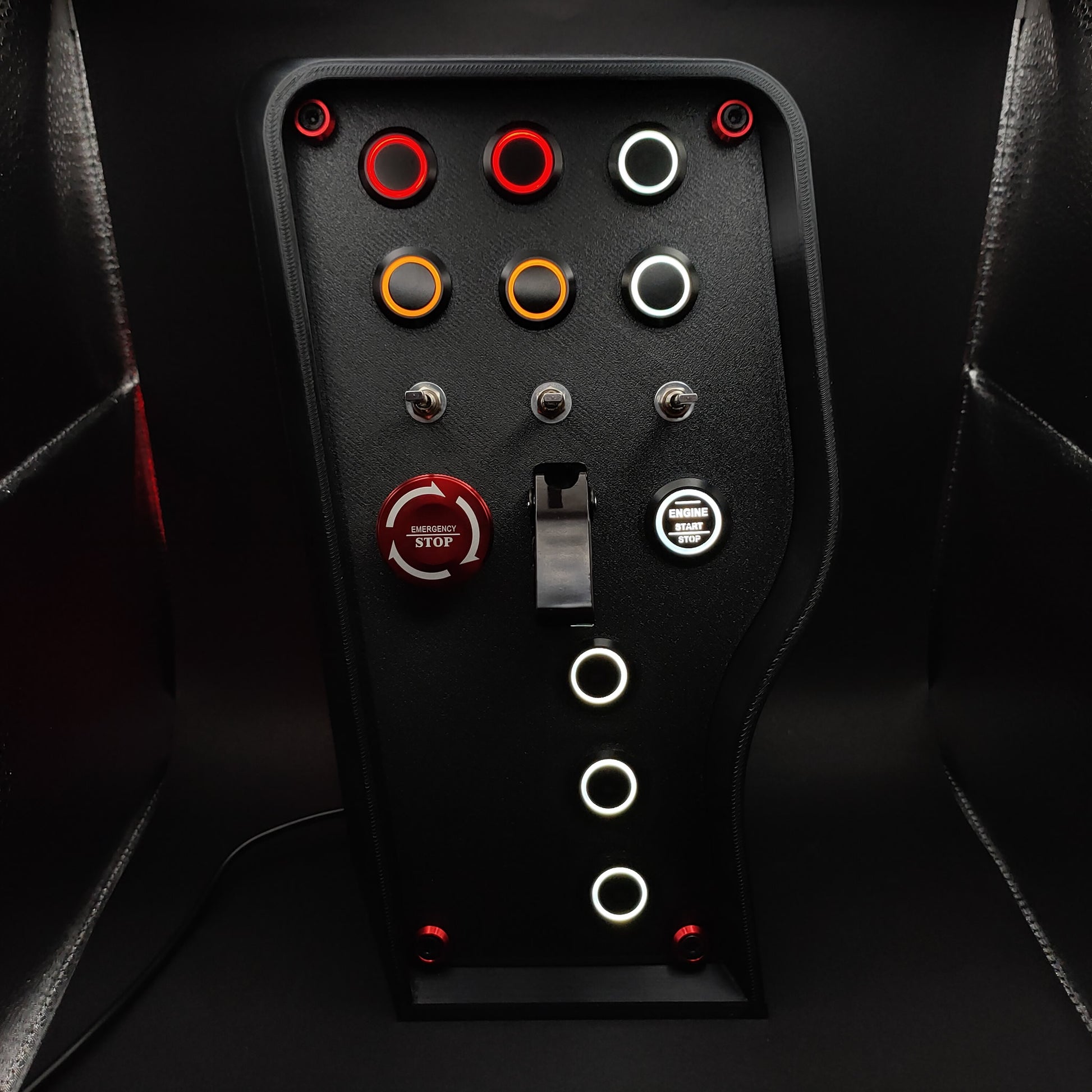 Nürburgring Edition button box with matte panel, E-Stop button, and black ignition toggle cover.