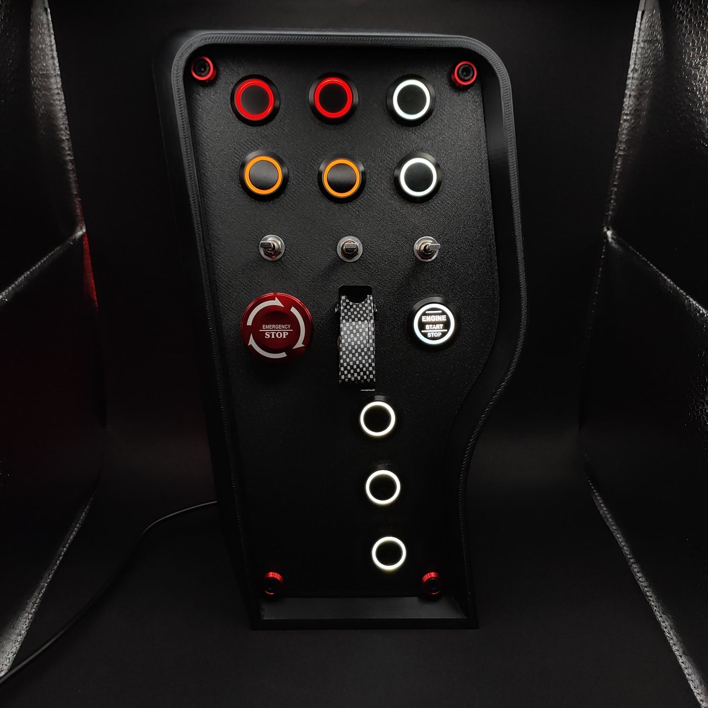 OSG Nürburgring Edition button box with industrial 3-way toggles and a carbon fibre toggle cover.