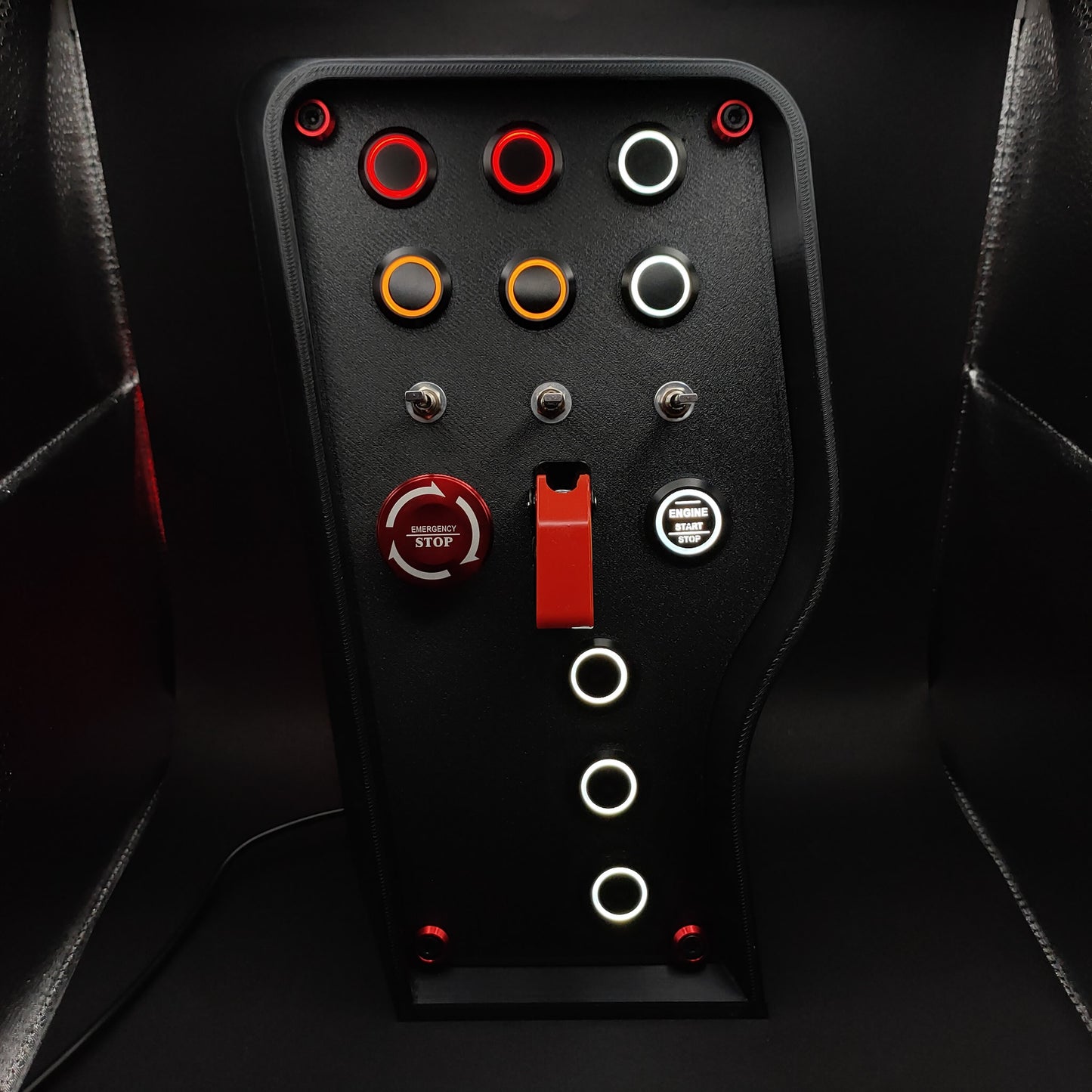 Nürburgring Edition button box with matte panel, E-Stop button, and red ignition toggle cover.