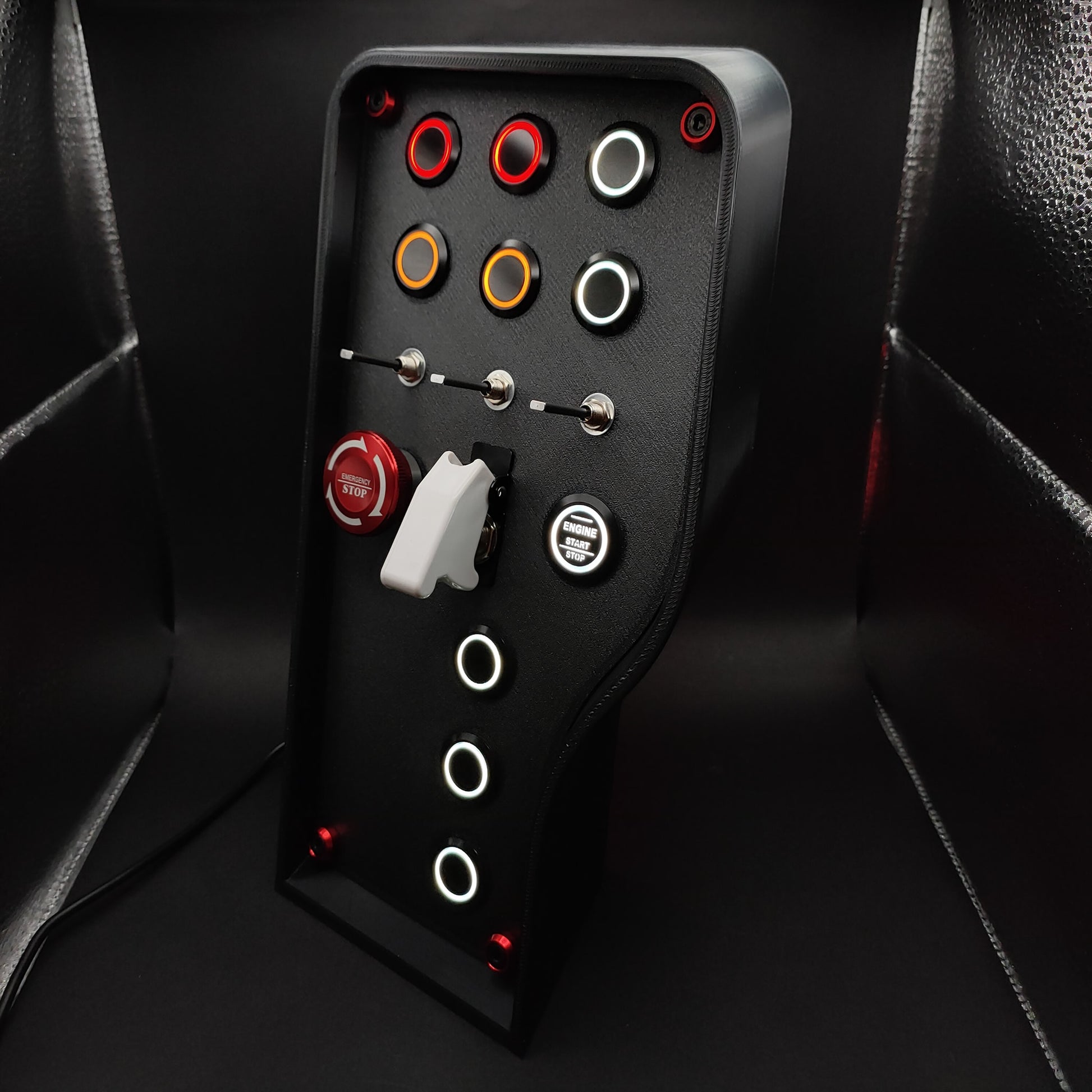 Left perspective of the Nürburgring box highlighting the red anodised bolt trim and 3-way toggles.