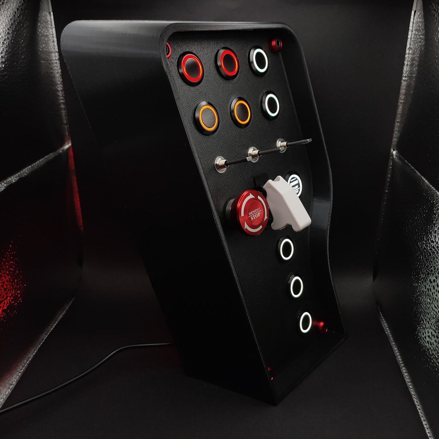 Right angle view of the Nürburgring Edition showing the black aluminium buttons and patriotic German LEDs.
