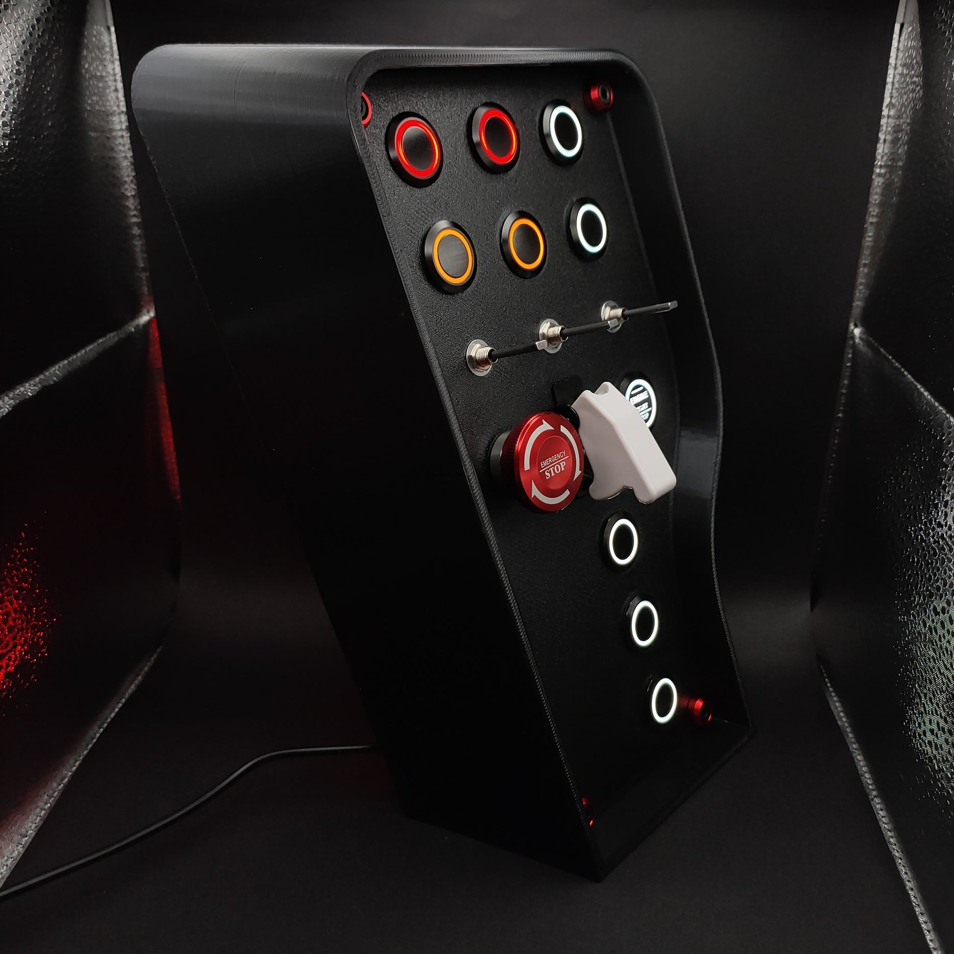 Right angle view of the Nürburgring Edition showing the black aluminium buttons and patriotic German LEDs.