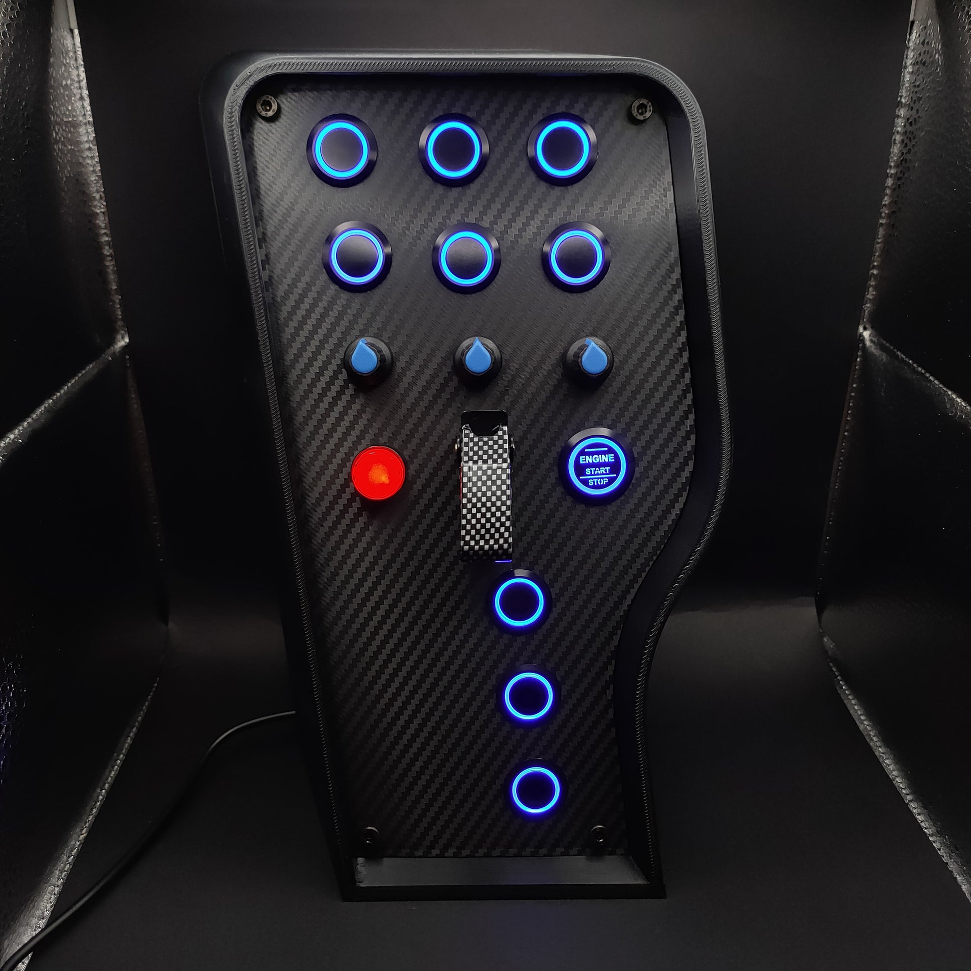 Sport Blue Edition button box featuring carbon fibre faceplate, blue LED rings, and carbon fibre toggle cover.