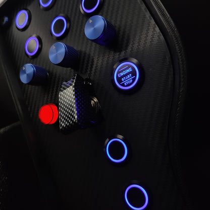 Close-up of blue machined aluminium rotary encoders and Engine Start button on Sport+ Blue edition.