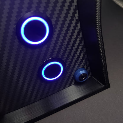 Detail shot of blue anodised aluminium bolt trim and blue LED illuminated momentary push buttons.