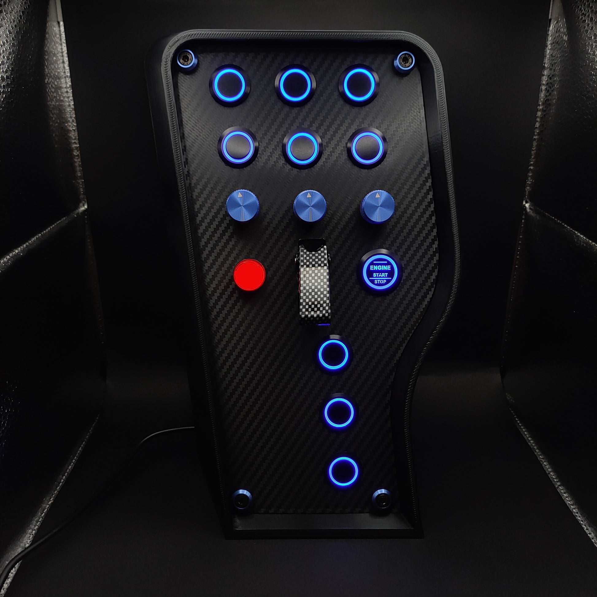 Sport+ Blue Edition button box featuring carbon fibre faceplate, blue LED rings, and carbon fibre toggle cover.