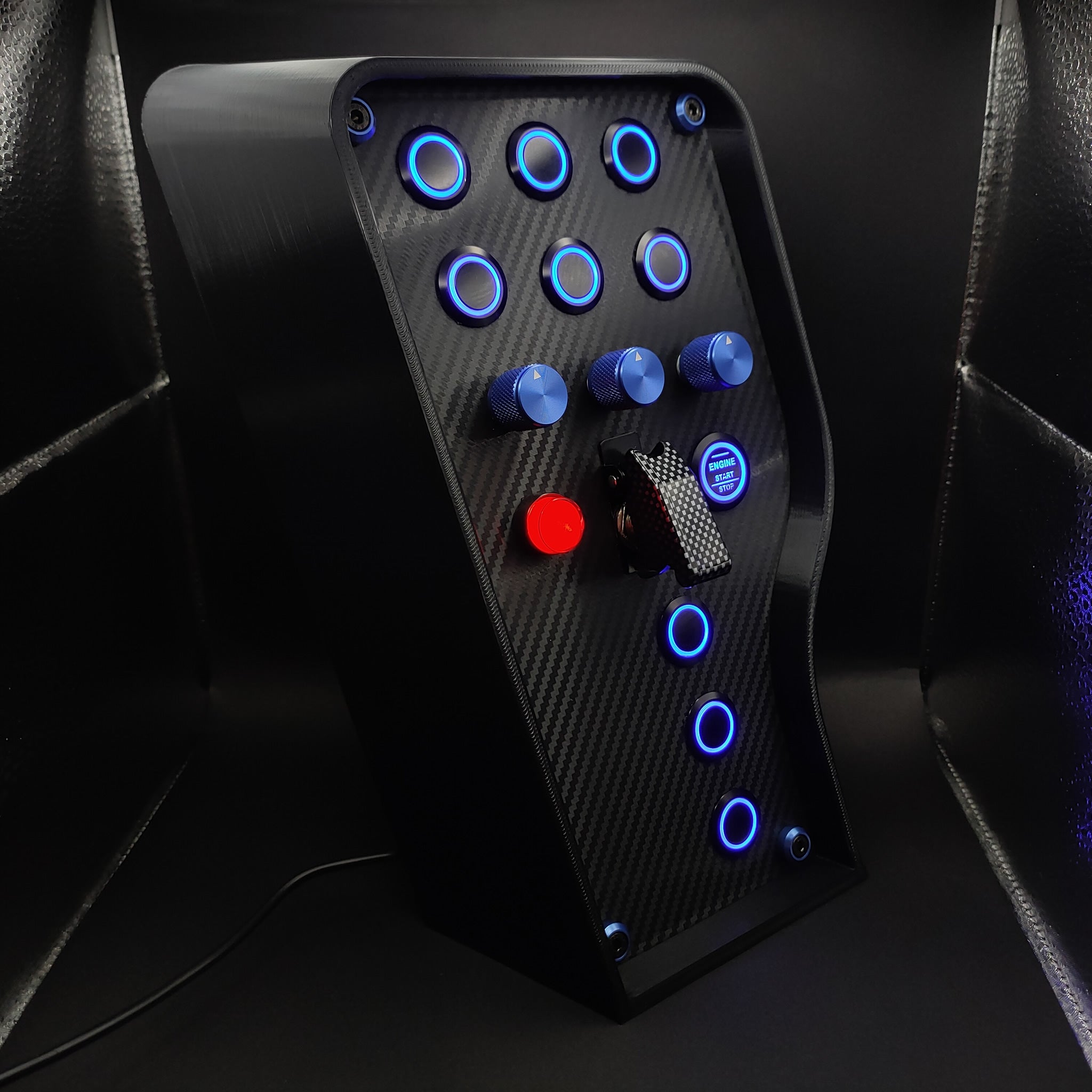 Right side view of Sport+ Blue Edition box highlighting carbon fibre finish and blue illuminated push buttons.