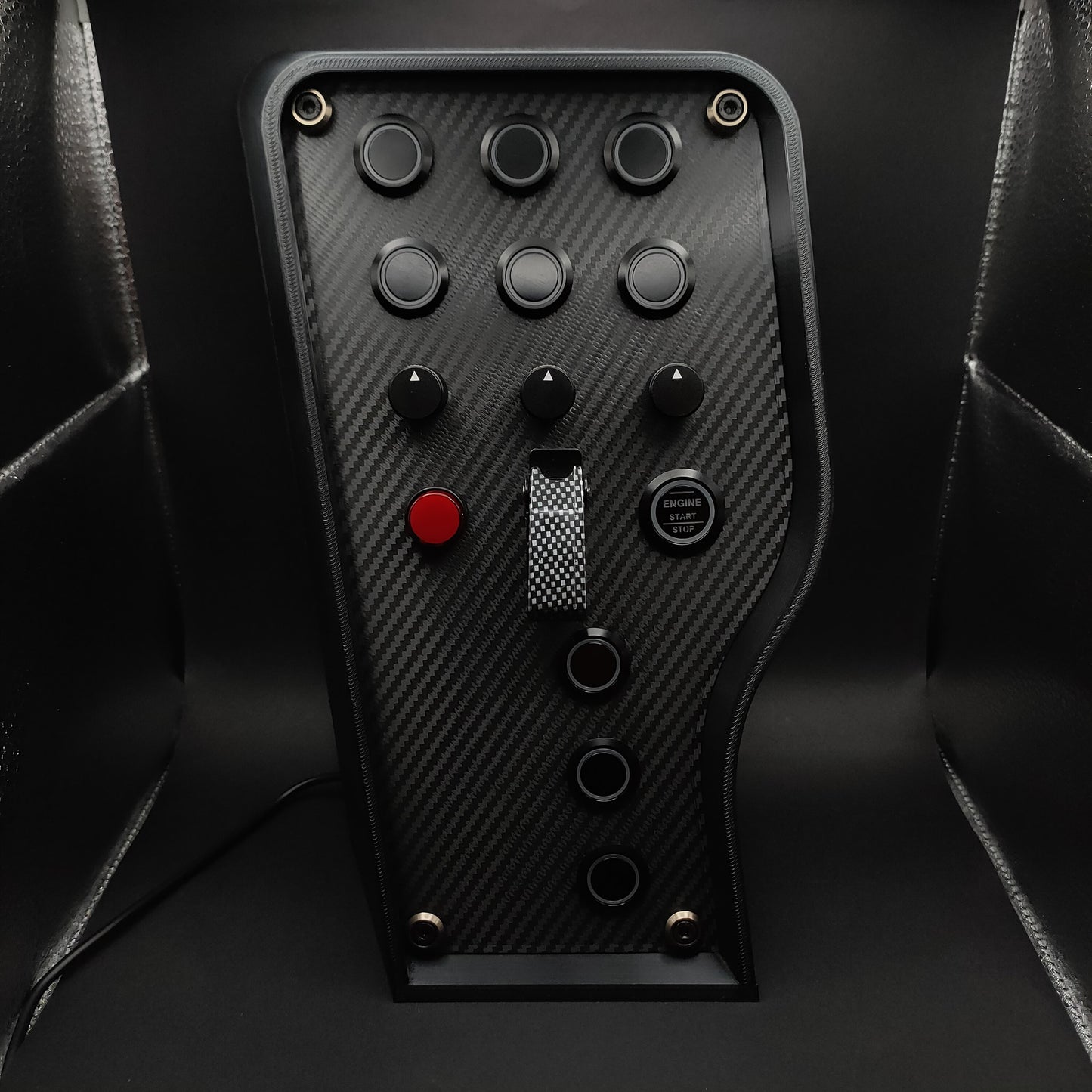 Sport+ Shadow sim box showing black aluminium encoders and carbon finish (LEDs powered off).
