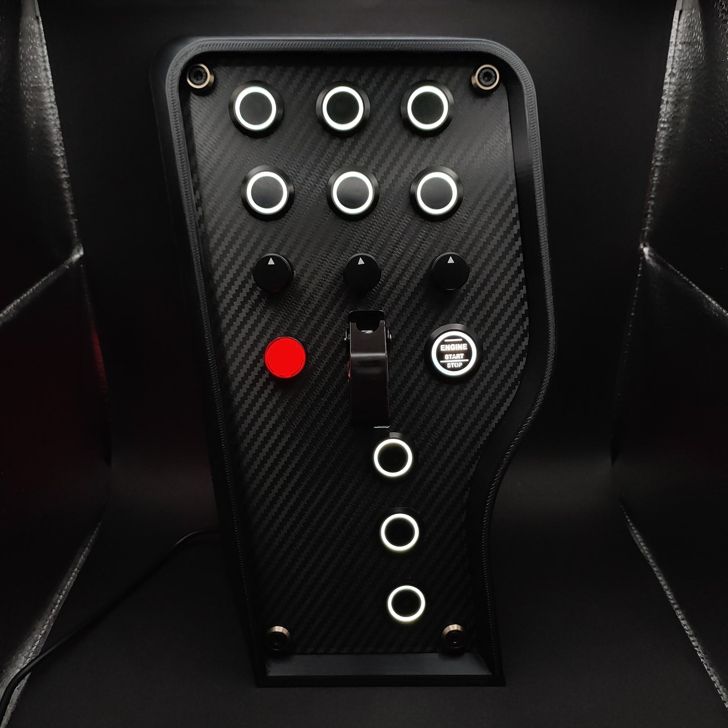 Sport+ Shadow Edition sim box with carbon fibre panel, black hardware, and white LEDs.