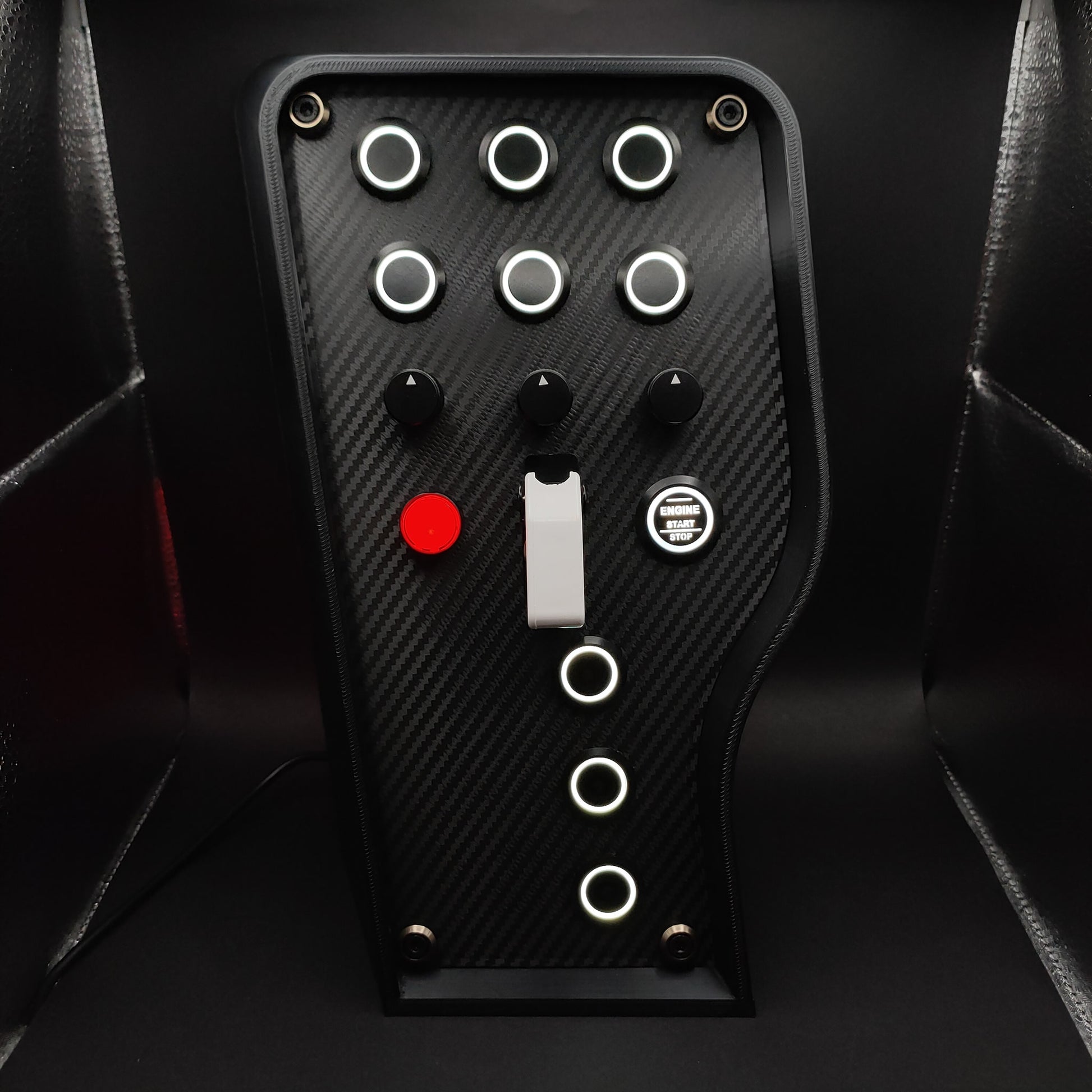 Sport+ Shadow button box featuring all-black and gunmetal grey anodised trim and a high-contrast white toggle.