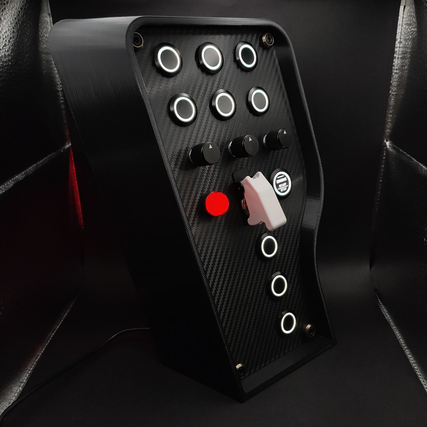 Right angle view of the Sport+ Shadow showing the red LED push button and black hardware.
