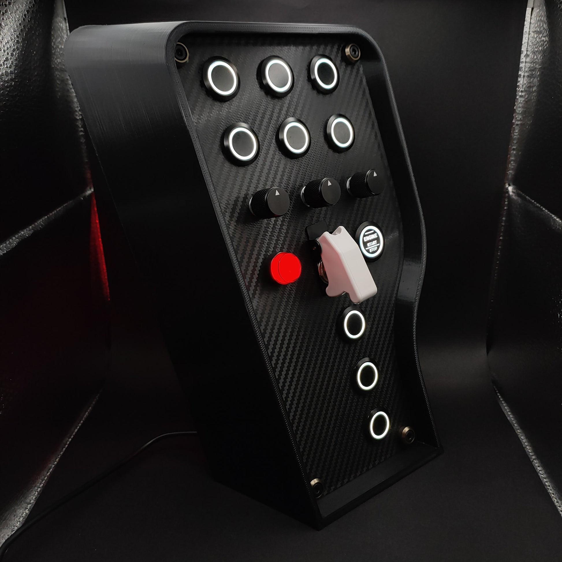 Right angle view of the Sport+ Shadow showing the red LED push button and black hardware.