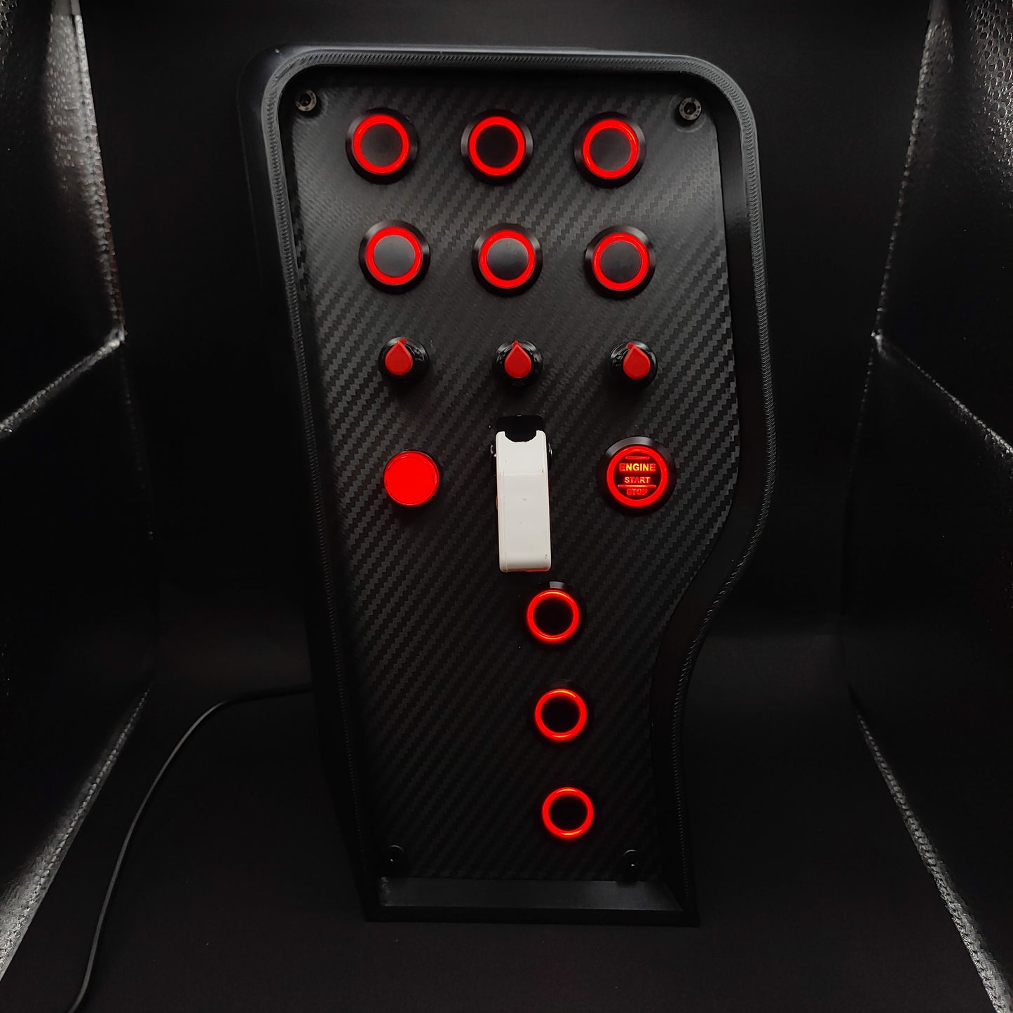 Sport Red Edition carbon fibre button box with red LED rings and high-contrast white toggle cover.