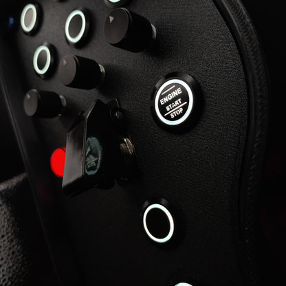 Close-up of black machined aluminium rotary encoders and white LED start button on Blue Edition.